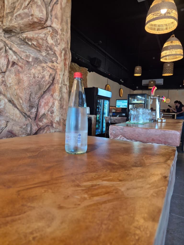 Cash register at the bar area and the seating corner